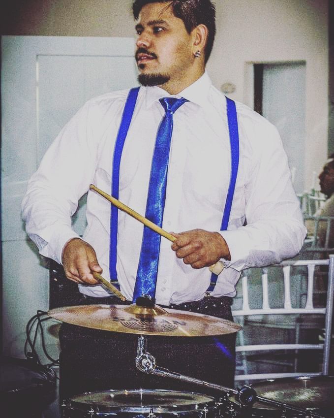 Renan playing marimba