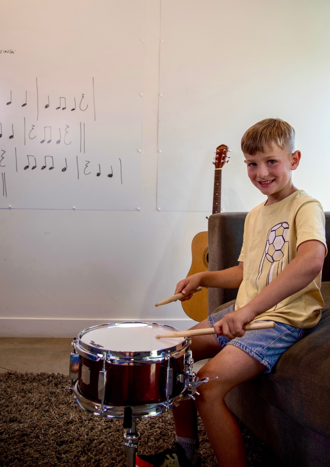 A young student at the snare drum